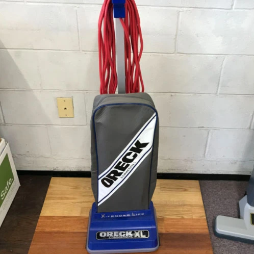 Oreck commercial upright vacuum — serviced and sold by Collins Quality Vacuums